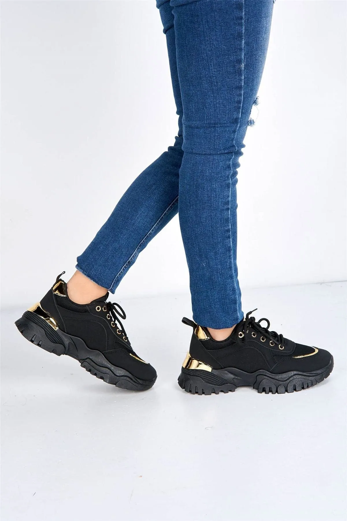 Volos Chunky Sole Gold Trim Trainer in Black