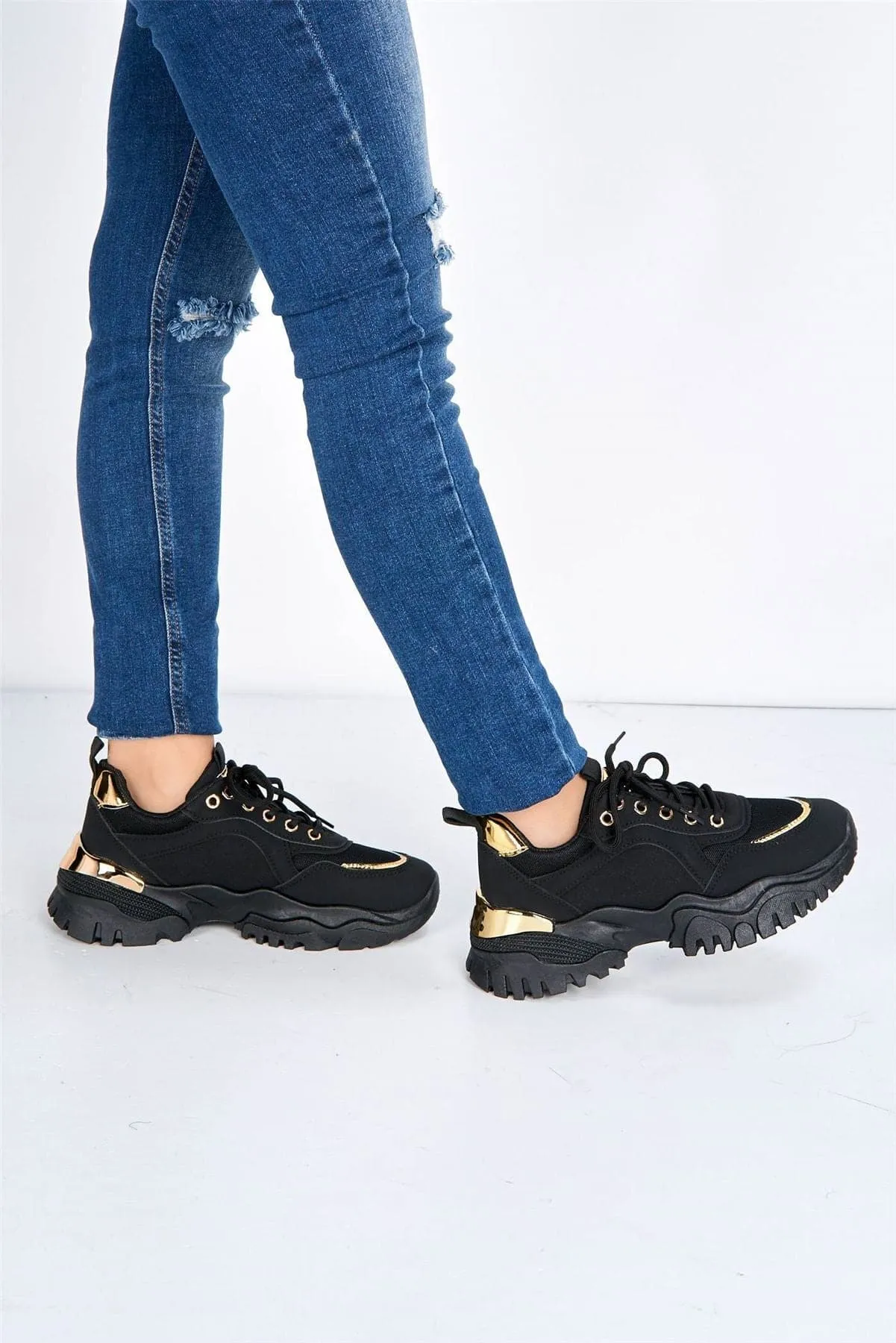 Volos Chunky Sole Gold Trim Trainer in Black